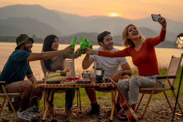 Beautiful Caucasian woman use mobile phone to selfie with her friend during camping and enjoy together near lake with sunset and they look happy for party outdoor., model released, , 59068286.jpg, outdoors, picnic, party, cheers, drink, eating, sunset, activity, campfire, carefree, casual, lifestyle, asian, beer, camp, adult, adventure, caucasian, enjoying, freedom, friends, friendship, fun, group, guitar, happiness, happy, holiday, joy, joyful, laughing, leisure, nature, outdoor, people, play, portrait, recreation, relaxation, sitting, summer, together, togetherness, travel, trip, twilight, vacation, weekend, young RECORD DATE NOT STATED