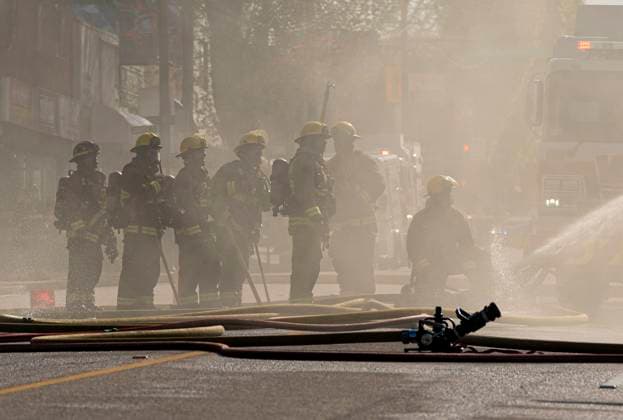 April 23, 2025, Vancouver, Bc, CANADA: Vancouver firefighters work on putting out hot spots of a three alarm fire on East Hastings Street in Vancouver, on Wednesday April 23, 2025. Vancouver CANADA  - ZUMAc35_ 20250423_zaf_c35_028 Copyright: xRichxLamx