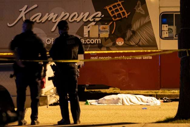 April 26, 2025, Vancouveer, Bc, CANADA: A victim lies near a food truck after a car drove into a crowd at the Lapu Lapu Festival in Vancouver on Saturday April 26, 2025. There has been a number of fatalities and numerous injuries. Vancouveer CANADA  - ZUMAc35_ 20250426_zaf_c35_087 Copyright: xRichxLamx