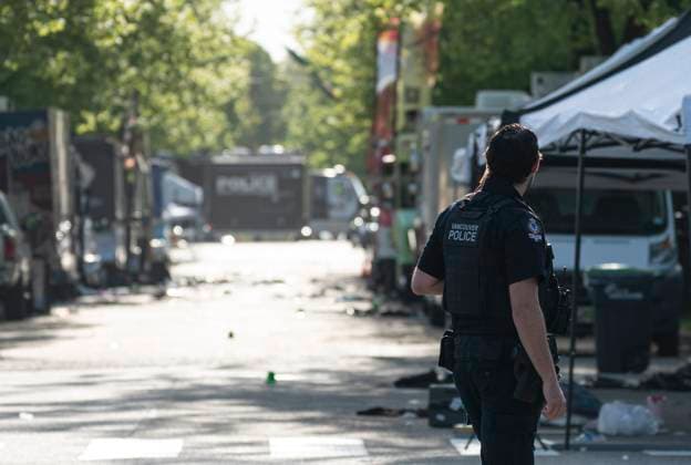 April 27, 2025, Vancouver, Bc, CANADA: A Vancouver Police officer secures the scene where a vehicle drove into crowd at a street festival the night before in Vancouver on Sunday April 27, 2025. Vancouver CANADA  - ZUMAc35_ 20250427_zaf_c35_016 Copyright: xRichxLamx