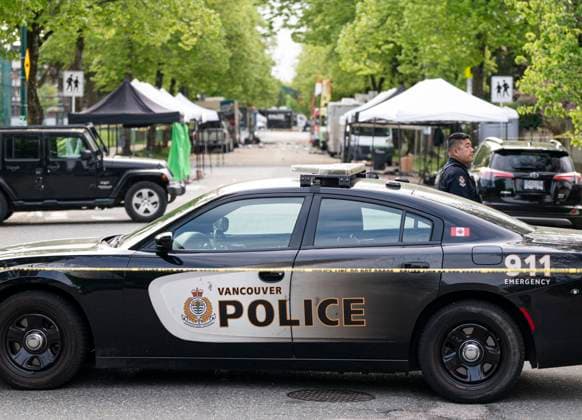 April 27, 2025, Vancouver, Bc, CANADA: A Vancouver Police vehicle blocks the street leading the location where a vehicle drove into crowd, at a street festival on the night before, in Vancouver on Sunday April 27, 2025. Vancouver CANADA  - ZUMAc35_ 20250427_zaf_c35_025 Copyright: xRichxLamx
