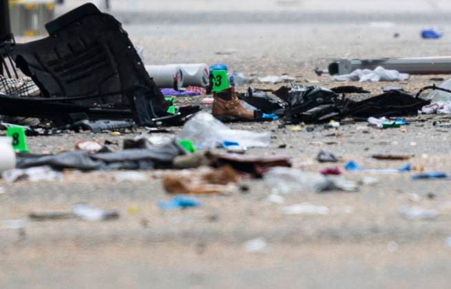 April 27, 2025, Vancouver, Bc, CANADA: Debris and evidence markers lay on the street while police investigate after a vehicle drove into crowd at a street festival Saturday evening in Vancouver, Sunday, April 27, 2025. Vancouver CANADA  - ZUMAc35_ 20250427_zaf_c35_064 Copyright: xRichxLamx