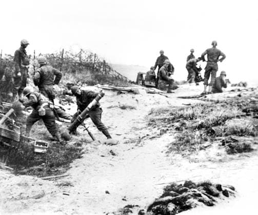 June 6, 1944, Normandy, France: U.S. mortar crew standing back just before firing into Nazi position along Normandy Coast, France, U.S. Army Signal Corps, June 6, 1944 France - ZUMAg145 19440606_aza_g145_008 Copyright: xJTxVintagex