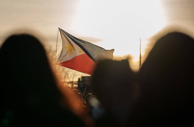 April 28, 2025, Ottawa, On, Canada: A Filipino flag waves in the air during a vigil on Parliament Hill for the victims of an attack that killed 11 people at a Vancouver Filipino heritage festival on Saturday, in Ottawa, on Monday, April 28, 2025. Ottawa Canada  - ZUMAc35_ 20250428_zaf_c35_082 Copyright: xChrisxTanouyex