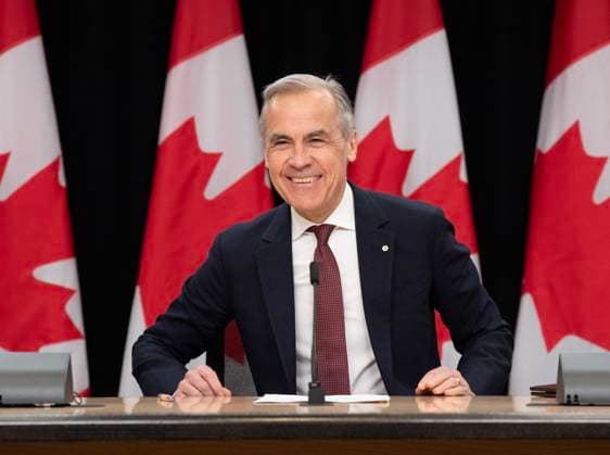 May 2, 2025, Ottawa, On, Canada: Prime Minister Mark Carney smiles as he takes his seat at his first news conference since winning the federal election, in Ottawa, Friday, May 2, 2025. Ottawa Canada  - ZUMAc35_ 20250502_zaf_c35_057 Copyright: xAdrianxWyldx