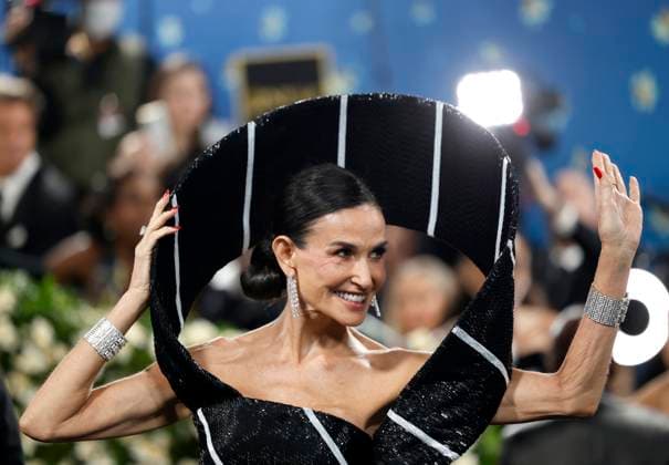 Demi Moore arrives on the red carpet at the 2025 Met Gala celebrating the opening of Superfine: Tailoring Black Style at The Metropolitan Museum of Art on Monday, May 5, 2025 in New York City.  NYP20250505118 JOHNxANGELILLO