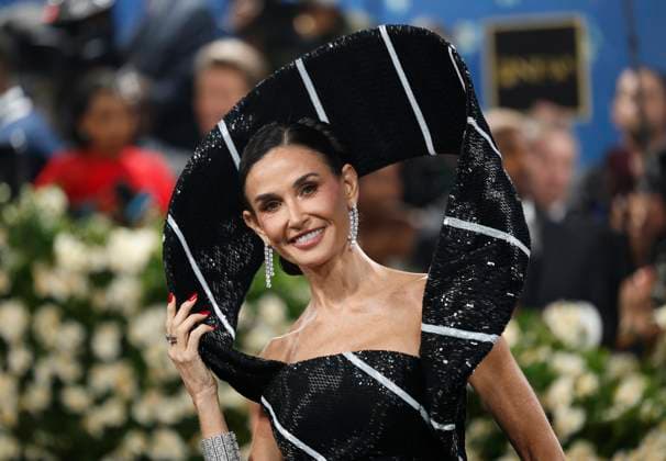Demi Moore arrives on the red carpet at the 2025 Met Gala celebrating the opening of Superfine: Tailoring Black Style at The Metropolitan Museum of Art on Monday, May 5, 2025 in New York City.  NYP20250505918 JOHNxANGELILLO