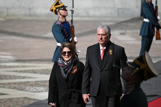 President of Russia Vladimir Putin s meeting with foreign leaders 8920625 09.05.2025 Cuban President Miguel Diaz-Canel, center, and his wife, Liz Cuesta Peraza, arrive at the Kremlin to meet with Russian President Vladimir Putin ahead of the military parade to mark the 80th anniversary of Victory. On May 9, Russia celebrates the 80th anniversary of Victory in the Great Patriotic War of 1941-1945. Crediting the source in the following order photographer s name Host photo agency RIA Novosti? is mandatory when using the photo Alexei Danichev Host photo agency RIA Novosti Moscow Russia  Copyright: xAlexeixDanichevx