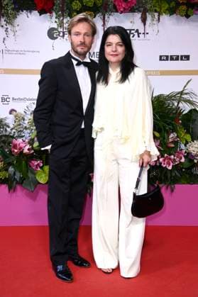 Andreas Pietschmann und Jasmin Tabatabai bei der 75. Verleihung des Deutschen Filmpreises 2025 im Theater am Potsdamer Platz. Berlin, 09.05.2025