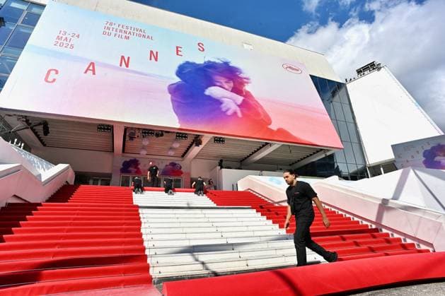 Cannes - Red Carpet Roll Out Workers prepare the red carpet to be rolled out ahead of the 78th annual Cannes Film Festival on May 13, 2025 in Cannes, France. Photo by Franck Caste ABACAPRESS.COM Cannes France  Copyright: xCastelxFranck ABACAx