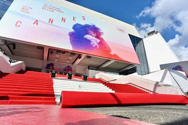 Cannes - Red Carpet Roll Out Workers prepare the red carpet to be rolled out ahead of the 78th annual Cannes Film Festival on May 13, 2025 in Cannes, France. Photo by Franck Caste ABACAPRESS.COM Cannes France  Copyright: xCastelxFranck ABACAx