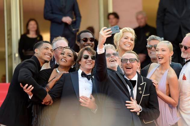 French actress Pom Klementieff, American actress Angela Bassett, actors Tom Cruise, Greg Tarzan Davis, Tarmell Tillman, Esai Morales, director Christopher McQuarrie, British actor Simon Pegg, actresses Hayley Atwell and Hannah Waddingham enjoy a selfie as they attend the premiere of Mission: Impossible- The Final Reckoning at the 78th Cannes Film Festival in Cannes, France on Wednesday May 14, 2025. CAN2025051452 RoccoxSpaziani