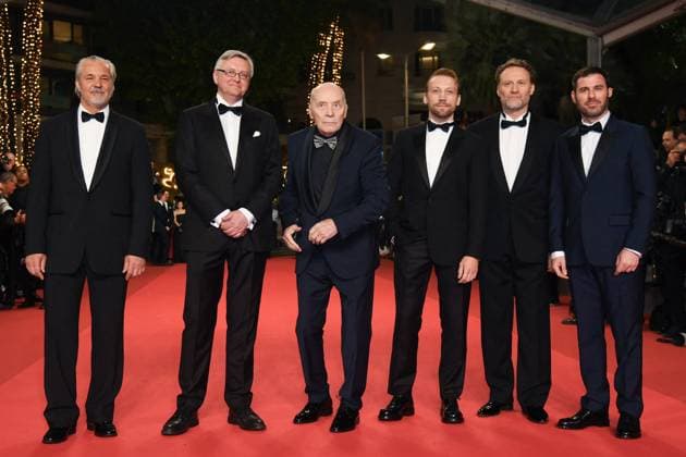 Cannes Two Prosecutors Screening AM Vytautas Kaniusonis, Aleksandr Filippenko, Sergei Loznitsa, Aleksandr Kuznetsov, Anatoliy Beliy and Kevin Chneiweiss attending the red carpet for the premiere of Two Prosecutors, in Competition for the Palme d’Or, Cannes, France on May 14, 2025 as part of the 78th Cannes Film Festival. Photo by Aurore Marechal ABACAPRESS.COM Cannes France  Copyright: xMarechalxAurore ABACAx