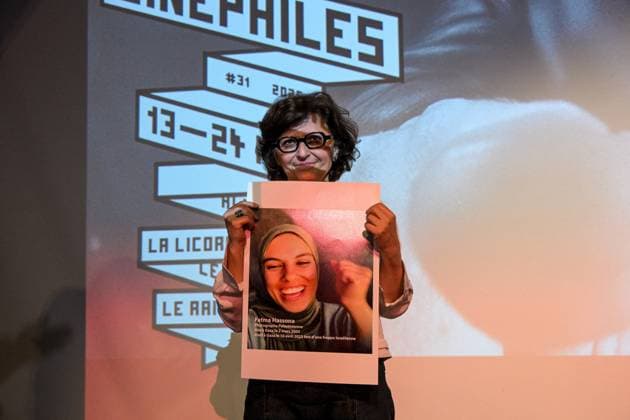 Cannes - Screening Put Your Soul on Your Hand and Walk French Iranian Sepideh Farsi reacts with a photo of killed Palestinian photographer Fatma Hassona, killed in an Israeli attack on her house, at the end of the screening of her movie ‘Put Your Soul on Your Hand and Walk’, as part of ACID competition, at the 78th annual Cannes Film Festival, in Cannes, France, on May 15, 2025. Photo by Ammar Abd Rabbo ABACAPRESS.COM Cannes France  Copyright: xAbdxRabboxAmmar ABACAx