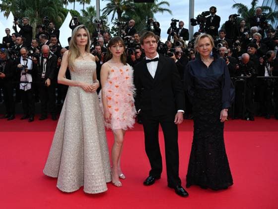 Cannes, 78th Cannes Film Festival 2025 - Evening 4 - Red Carpet of the Film Eddington Cannes, 78th Cannes Film Festival 2025 - Evening 4 - Red Carpet of the Film Eddington . In the photo Angelina Jolie, Marie Colomb, Finn Bennett and Caroline Scheufele Cannes France  Copyright: xIPA ABACAx