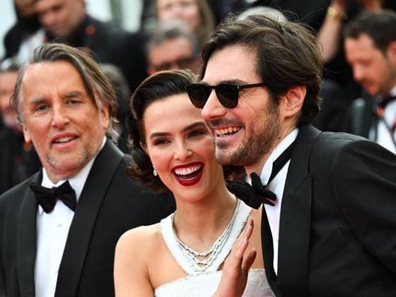 Cannes, 78th Cannes Film Festival 2025 - evening 5 - red carpet of the film Die, My Love Cannes, 78th Cannes Film Festival 2025 - evening 5 - red carpet of the film Die, My Love . In the photo Richard Linklater, Zoey Deutch, Guillaume Marbeck Cannes France  Copyright: xIPA ABACAx