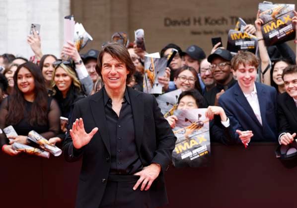 Tom Cruise greets fans when he arrives on the red carpet at the Mission: Impossible The Final Reckoning New York Premiere at Lincoln Center on Sunday, May 18, 2025 in New York City.  NYP20250518105 JOHNxANGELILLO