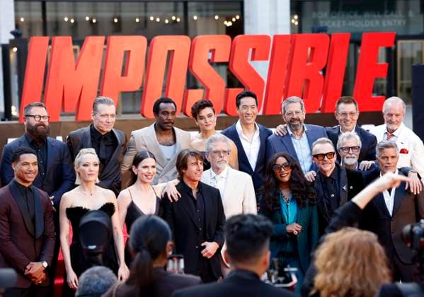 Pom Klementieff, Hayley Atwell, Tom Cruise, director Christopher McQuarrie and other members of the cast and crew stand for a photo on the red carpet at the Mission: Impossible The Final Reckoning New York Premiere at Lincoln Center on Sunday, May 18, 2025 in New York City.  NYP202505181242 JOHNxANGELILLO