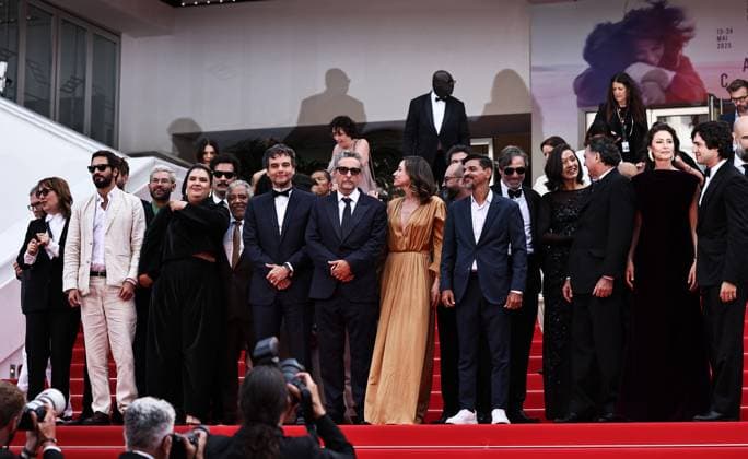 (250519) -- CANNES, May 19, 2025 -- Brazilian director Kleber Mendonca Filho (front 5th L), Brazilian actor and producer Wagner Moura (front 4th L) and cast members leave after the screening of the film The Secret Agent at the 78th edition of the Cannes Film Festival in Cannes, southern France, on May 18, 2025. ) FRANCE-CANNES-FILM FESTIVAL-THE SECRET AGENT-SCREENING GaoxJing 