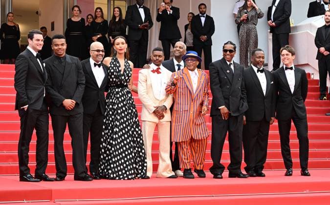 American actress Ilfenesh Hadera, director Spike Lee, actors Denzel Washington, Wendell Pierce, Jeffrey Wright, Aubrey Joseph, Elijah Wright, actor musician Asap Rocky, producers Alan Fox and Jason Berman attend the premiere of Highest 2 Lowest at the 78th Cannes Film Festival in Cannes, France on Monday May 19, 2025.  CAN20250519170 RUNExHELLESTAD