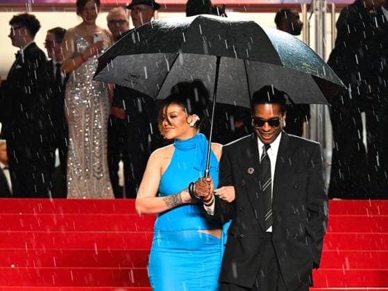 Cannes, 78th Cannes Film Festival 2025 - evening 7 - Asap and Rihanna Under Umbrella Cannes, 78th Cannes Film Festival 2025 - evening 7 - Red Carpet of the film Highest 2 Lowest . In the photo Asap Rocky (A Rocky) and Rihanna Cannes France  Copyright: xIPA ABACAx