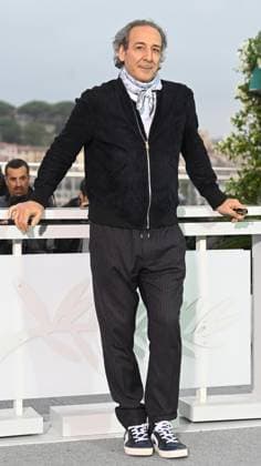 Italian composer Alexandre Desplat attends the photo call for Eagles Of The Republic at the 78th Cannes Film Festival in Cannes, France on Tuesday May 20, 2025.  CAN20250520133 RUNExHELLESTAD