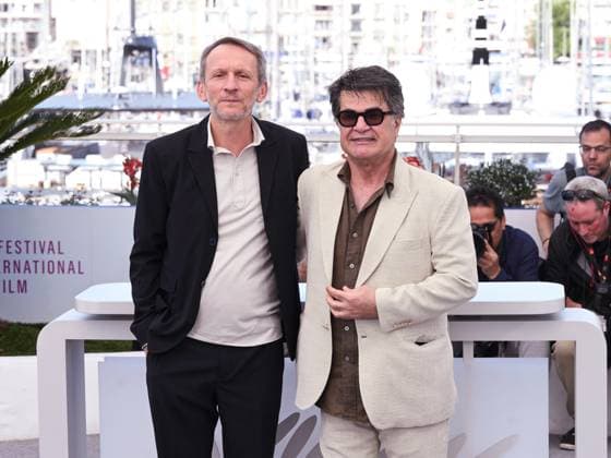 Cannes, 78th Cannes Film Festival 2025 - day 9 - Photocall of the film Un Simple Accident In the photo: Philippe Martin and Jafar Panahi  Copyright: xSimonexComix xipa-agency.netx xManuelexMangiarottix IPA_Agency_IPA58019472