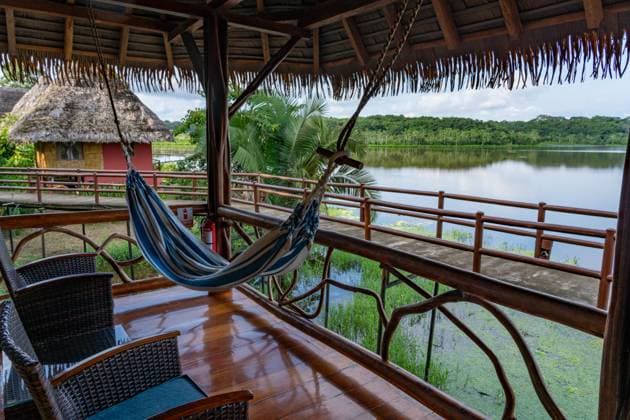Vew of the front deck of a room in the Napo Wildlife Center Ecolodge in the Amazon Basin in Ecuador. Yasuni National Park Napo Wildlife Center Orellana Province Ecuador Copyright: xJonxG.xFullerx xVWPicsx 9632-JGF-interiors-Napo-Ecolodge-EC