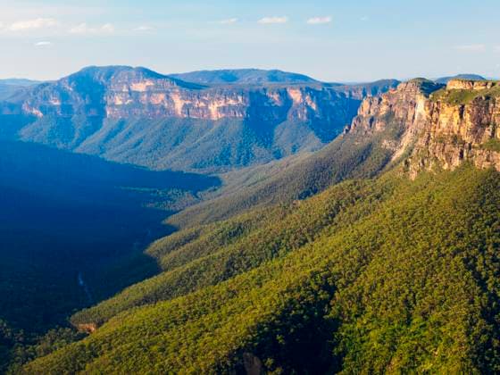 Creative Highlights World Rock formations of Blue Mountains on sunny day Blackheath, New South Wales, Australia, 04.06.2024, ,property released TTBB_tbs7601146.jpg, Outdoors,Blackheath,Blue Mountains - Australia,Day,Cliff,No People,Landscape - Scenery,Mountain Range,Rock Formation,Scenics - Nature,Travel,Australia,Landscape,Sunlight,Valley,Eroded,Forest,Horizontal,New South Wales Copyright: xWesxWalker TetraxImagesx