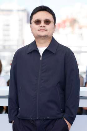 Bi Gan beim Photocall zum Kinofilm Kuang ye shi dai Resurrection auf dem Festival de Cannes 2025 78. Internationale Filmfestspiele von Cannes am Palais des Festivals. Cannes, 23.05.2025