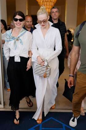 Cannes - Elle Fanning Leaves Hotel Martinez Elle Fanning leaves Hotel Martinez to take a stroll along Croisette ahead the 78th annual Cannes Film Festival on May 24, 2025 in Cannes, France. Photo by Marco Piovanotto ABACAPRESS.COM Cannes France  Copyright: xPiovanottoxMarco ABACAx