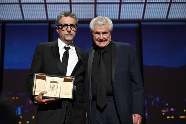 Cannes - Closing Ceremony Brazilian director Kleber Mendonca Filho receives the Best Director prize and his accompanied by French director Claude Lelouch for the film O Agente Secreto (The Secret Agent) from French director Claude Lelouch during the closing ceremony at the 78th edition of the Cannes Film Festival in Cannes, southern France, on May 24, 2025. Cannes France  Copyright: xNivierexDavid ABACAPRESS.COMx