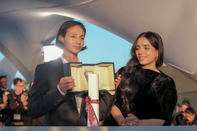 78eme Festival International du Film de Cannes Photocell des palmes 78th International Cannes Film Festival Photocall with winners Prix du jury Hafsia Herzi accompanies her actress who won the prix dinterpretation feminine for La petite Derniere 445099 2025 05 24 France Melliti, Nadia Herzi, Hafsia  Copyright: xFranckxBoutonnetx xStarfacex STAR_445099_142