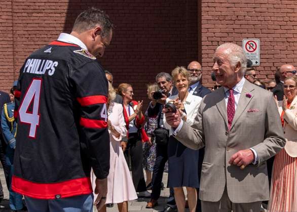 May 26, 2025, Ottawa, On, CANADA: King Charles speaks with former Ottawa Senators NHL hockey player Chris Phillips, left, after participating in a ceremonial puck drop during a visit to Lansdowne Park in Ottawa on Monday, May 26, 2025. Ottawa CANADA  - ZUMAc35_ 20250526_zaf_c35_074 Copyright: xChristinnexMuschix