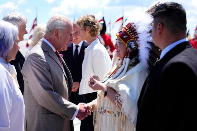 May 26, 2025, Ottawa, On, CAN: National Chief of the Assembly of First Nations Cindy Woodhouse Nepinak shows King Charles an original treaty medal given to her ancestor during the signing of Treaty 2, as he arrives at the Ottawa International Airport in Ottawa for a royal visit on Monday, May 26, 2025. Ottawa CAN  - ZUMAc35_ 20250526_zaf_c35_121 Copyright: xJustinxTangx