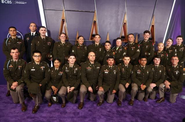 Members of the United States military arrive for the 51st annual American Music Awards at the Fontainebleau Las Vegas on Monday, May 26, 2025.  LAV20250525410 JAMESxATOA