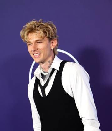 Machine Gun Kelly arrives for the 51st annual American Music Awards at the Fontainebleau Las Vegas on Monday, May 26, 2025.  LAV20250525495 JAMESxATOA