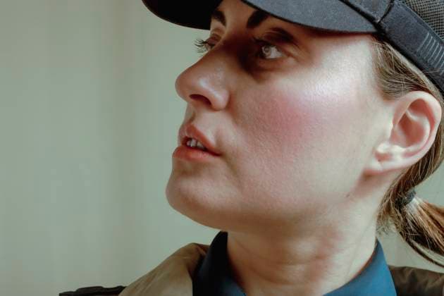 Creative Highlights Symbolbilder Portrait of a detective woman in a cap looking away with a cinematic filter model released, Symbolfoto, RDTF00455