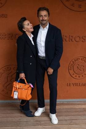 French Open - Vips At The Village - Day 3 Henri Leconte and Maria Dowlatshahi take a pose at Roland Garros for the French open on May 27, 2025, in Paris, France. Photo by Laurent Zabulon ABACAPRESS.COM Paris France  Copyright: xZabulonxLaurent ABACAx
