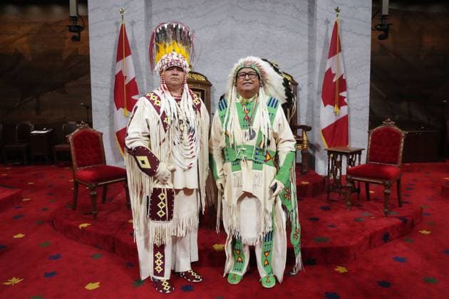 May 27, 2025, Ottawa, On, Canada: Siksika Nation Chief Ouray Crowfoot, left, and and Elder Leonard Weasel Traveller pose ahead of King Charles delivering the speech from the throne in the Senate in Ottawa on Tuesday, May 27, 2025. Ottawa Canada  - ZUMAc35_ 20250527_zaf_c35_007 Copyright: xChrisxYoungx