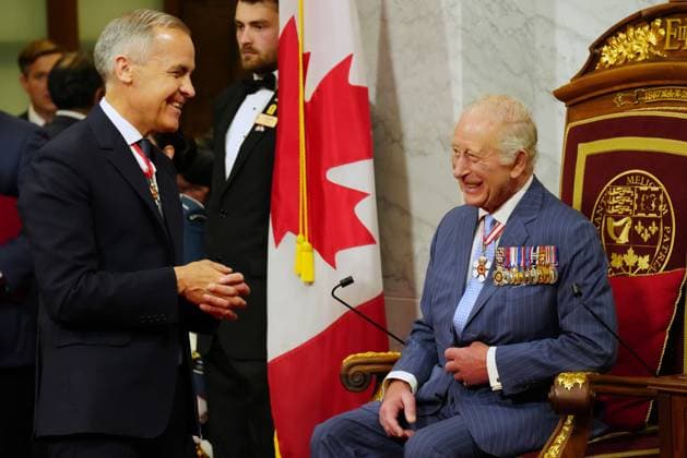 May 27, 2025, Ottawa, On, Canada: Prime Minister Mark Carney, left, speaks with King Charles ahead of the King delivering the speech from the throne in the Senate in Ottawa on Tuesday, May 27, 2025. Ottawa Canada  - ZUMAc35_ 20250527_zaf_c35_317 Copyright: xChrisxYoungx
