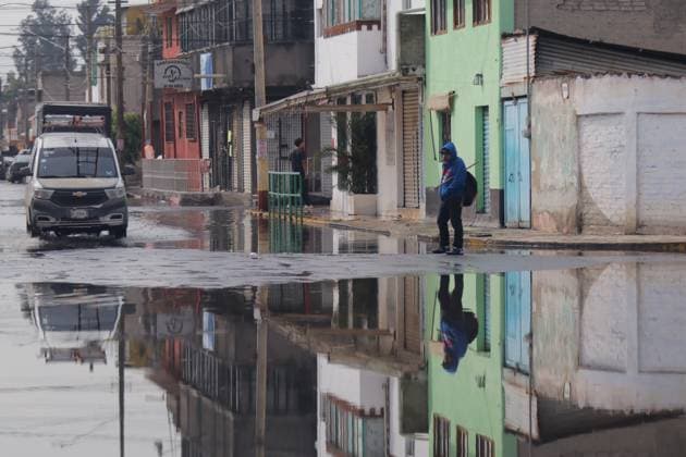 Heavy Rains Hit Mexico Causing Floods A person walks on a flooded street near the La Colmena pumping plant, on the border between the State of Mexico and Mexico City after the heavy rains that hit Mexico, affecting several municipalities. on June 3, 2025 in Mexico City, Mexico. (Photo by Carlos Santiago Eyepix Group) Copyright: xCarlosxSantiago xEyepixxGroupx CS_03062025_157536