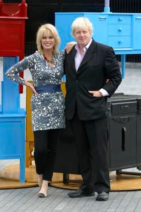 The launch of the old furniture recycling scheme JOANNA LUMLEY & BORIS JOHNSON (Mayor of London) The launch of the old furniture recycling scheme, The Scoop, More London, the Queen s Walk, London, England. July 12th, 2010 full length black suit grey gray white print trousers leggings top blue waist belt trousers hand on hip in pocket CAP JEZ JEZ London Great Britain Copyright: xJEZ CapitalxPicturesx