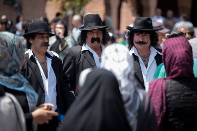 Bilder des Jahres 2025, News 06 Juni News Themen der Woche KW23 Iranians Marked Eid Al-Adha Traditional Iranian men with large mustaches and black hats participate in a celebration on the Muslim holiday of Eid al-Adha at Kahrizak nursing home in southern Tehran, Iran, on June 6, 2025. The Muslim community celebrates Eid al-Adha, the Feast of the Sacrifice, a Muslim holiday in which believers kill a sheep, sometimes a cow, to commemorate the sacred passage when Abraham, following the order of God, goes to kill his son Ismael, but God ultimately asks him to kill a sheep. Tehran Tehran Iran  Copyright: xMortezaxNikoubazlx originalFilename: nikoubazl-iranians250606_npOEy.jpg