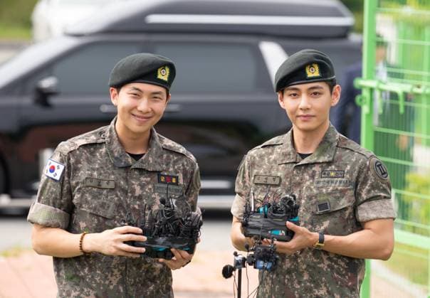 RM and V, June 10, 2025 : BTS members RM and V just after their military discharge in Chuncheon, about 100 km (62 miles) northeast of Seoul, South Korea. Four members of the K-pop boy group BTS -- V, RM, Jungkook and Jimin are discharged from their mandatory 18 month military service this week.  , aflo_294433510.jpg,