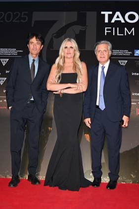 Taormina, 71st Taormina Film Festival 2025 - Day 2, Red Carpet. In the photo: Tiziana Rocca , Giulio Base  Copyright: xManuelexMangiarottix xipa-agency.netx xMangiarottix xD avanzox IPA_Agency_IPA58941420