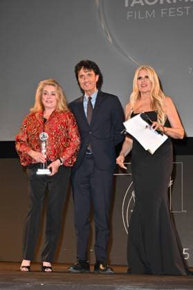 Taormina, 71st Taormina Film Festival 2025 - Day 2, Awards Ceremony. In the photo: Catherine Deneuve, Giulio Base  Copyright: xManuelexMangiarottix xipa-agency.netx xMangiarottix xD avanzox IPA_Agency_IPA58941930