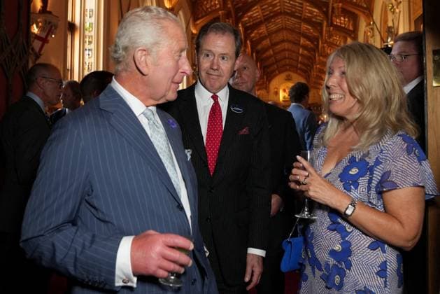 Britain s King Charles attends reception for the King s Award for Enterprise, in Windsor Vice Admiral Sir Anthony Johnstone-Burt looks at Britain s King Charles speaking with Lisa Kay, the founder, CEO, and lead designer of Sole Bliss Ltd, at a reception for the King s Award for Enterprise, at Windsor Castle, in Windsor, Britain, June 12, 2025., Credit:Maja Smiejkowska Avalon UNITED KINGDOM, Windsor  Copyright: xMajaxSmiejkowskax xAvalonx 1010080499