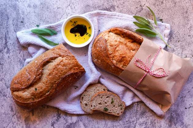 Stone Baked Light Rye Sourdough Bread Served with Olive Oil and Balsamic Vinegar. Stone Baked Light Rye Sourdough Bread Served with Olive Oil and Balsamic Vinegar. Copyright: xMilleflorexImagesx MIL140525-6