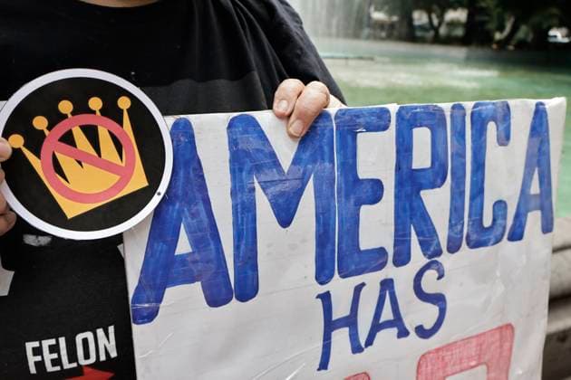 June 14, 2025, Mexico, Cdmx, Mexico: Not only in the Americas are protesting against President Donald Trump, but also abroad, a group of American citizens are taking to the streets of Mexico City toward the United States Embassy to show their disapproval and rejection of the recent violent actions, illegal deportations, and arrests against legal and illegal immigrants in Los Angeles and other sanctuary states. This anti-Trump demonstration is taking place on his birthday, to let him know that he is not a king, that they do not want tyrants, and that they will not celebrate the violence the Trump administration is inflicting on their own people. Mexico Mexico - ZUMAp204 20250614_zip_p204_016 Copyright: xJosuexPerezx